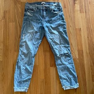 Studio blue size 30 stretchy mid rise jeans ripped